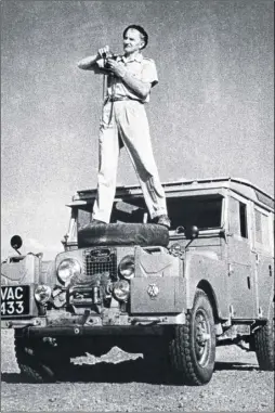  ??  ?? George Rodger on the Land Rover he took around Africa