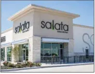  ?? (Special to the Democrat-Gazette) ?? Houston-based chain Salata Salad Kitchen is looking to expand into Central and Northwest Arkansas. Its restaurant­s are often at the end cap or corner of shopping centers so as to have a drive-thru window. Inside, customers proceed along a buffet combining bases and an unlimited amount of toppings for one base price.