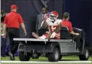  ?? DAVID J. PHILLIP — THE ASSOCIATED PRESS FILE ?? In this Sunday file photo, Kansas City Chiefs wide receiver Chris Conley (17) is taken off the field on a cart after he was injured during the second half of an NFL football game against the Houston Texans in Houston.