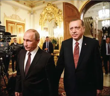  ?? OZAN KOSE/AFP ?? Turkish President Recep Tayyip Erdogan (right) and Russian President Vladimir Putin attend a press conference in Istanbul in October.