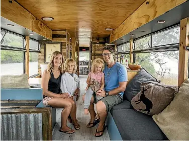  ?? PHOTO: BRADEN FASTIER/STUFF ?? Andy Cleverley spent a year converting the inside of a former school bus into a home, learning how to do the constructi­on through YouTube videos and Google.