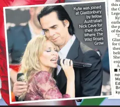  ??  ?? Kylie was joined at Glastonbur­y by fellow Australian Nick Cave for their duet, Where The Wild Roses Grow