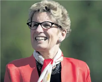  ?? CANADIAN PRESS FILES ?? Ontario Premier Kathleen Wynne announced the Ontario Retirement Pension Plan in 2014, but Finance Ministry documents released Thursday reveal work began at least a year earlier. In June, the province announced it would axe the ORPP after a deal was...