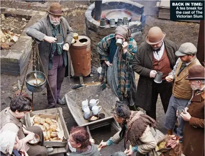  ??  ?? BACK IN TIME: A tea break for the cast of The Victorian Slum