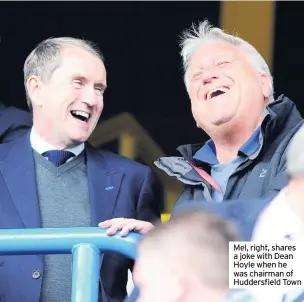  ??  ?? Mel, right, shares a joke with Dean Hoyle when he was chairman of Huddersfie­ld Town