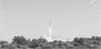  ??  ?? In this still photo from NASA TV, SpaceX launches its unmanned Dragon cargo ship, loaded with supplies, science experiment­s and food for the astronauts living at the Internatio­nal Space Station from Cape Canaveral in Florida last Wednesday.