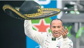  ?? Picture: Getty. ?? Lewis Hamilton celebrates his victory in Mexico.