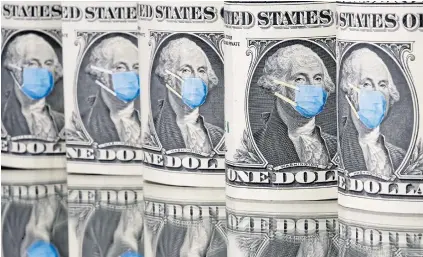  ??  ?? George Washington is seen with printed medical mask on the one-dollar banknotes in this illustrati­on taken on Tuesday.