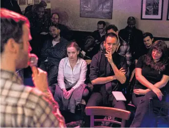  ??  ?? WHAT’S SO FUNNY?: An open-mike stand-up comedy session at the Metropolit­an Room in New York. On any given night, dozens of open mikes are held in the city, mostly in basements and back rooms.