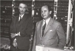  ?? ?? Fathers of the atomic bomb: Robert Oppenheime­r (left) and John von Neumann at the October 1952 dedication of the computer built for the Institute for Advanced Study.