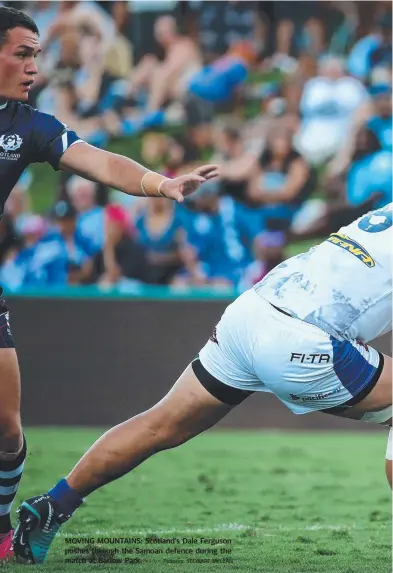  ?? Pictures: STEWART McLEAN ?? MOVING MOUNTAINS: Scotland's Dale Ferguson pushes through the Samoan defence during the match at Barlow Park.