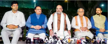  ?? — PTI ?? Home minister Amit Shah, BJP working president J.P. Nadda, Haryana Chief Minister M.L. Khattar, MoS finance mnurag Thakur and JJP leader Dushyant Chautala during a press conference in New Delhi on Friday.