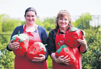  ?? PHOTO: REBECCA RYAN ?? Plenty of cheer . . . Looking forward to next month’s A Berry Affair are Butler's Berry Farm & Cafe cook and jam maker Jasmine Buckingham (left) and front of house Jane Riddle.