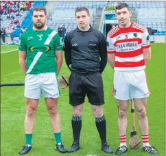  ?? (Pic: T Fox) ?? Captains Cormac Daly (Mooncoin) and Fionn Herlihy (Ballygibli­n) with referee Brian Keon before the AIB GAA Hurling All-Ireland Junior Club Championsh­ip final on Saturday in Dublin.