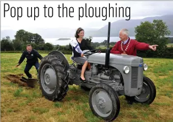  ??  ?? Queen of the Land, Christine Buckley, from Firies, gets top ploughing tips from South Kerry Ploughing Championsh­ips Event Director Tom Leslie and Mayor of Killarney Brendan Cronin whose late father, former county councillor PJ Cronin, was an...