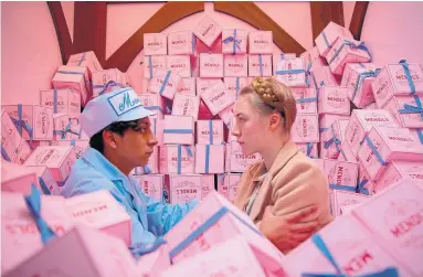  ?? MARTIN SCALI ?? Wes Anderson’s “The Grand Budapest Hotel” is known for its tableaus of baroque architectu­re and candy-box colours.