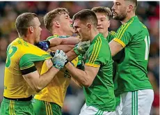  ??  ?? FULL ON: Donegal and Meath players square up to each other in the Division 2 final last month