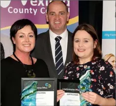  ??  ?? Sarah Buckley, winner of the 3rd level business plan and Samantha Morris, runner-up in the 3rd level business plan with Minister Paul Kehoe TD.