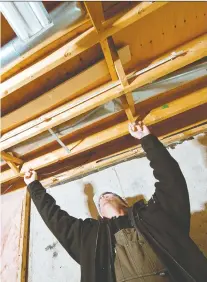  ?? ALEX SCHULDTZ/THE HOLMES GROUP. ?? You can finish your crawl space as a livable space, but Mike Holmes recommends extending your home into the yard if possible, rather than going underneath.