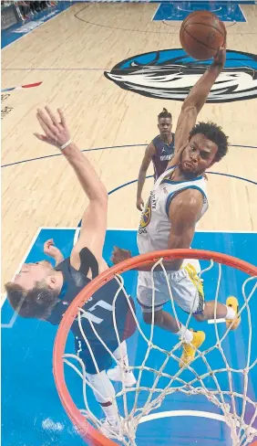  ?? GLENN JAMES GETTY IMAGES ?? Even Luka Doncic, the victim on a hellacious dunk by Andrew Wiggins in Game 3, had to tip his cap to the Canadian: “That was impressive, not gonna lie.”