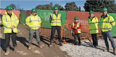  ?? ?? ●●Mayor of Whitworth Maureen Jones (third from right) laid a ceremonial brick at Gleeson Home’s developmen­t in Whitworth