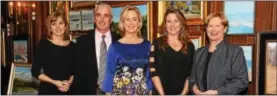  ?? JULIE MCNULTY PHOTO ?? Jacqueline Coccia (from left), Academy of Notre Dame principal, Art Show Chair Denick Herrin of Wayne, Paul Finley of Berwyn and his wife, Liz Finley, Fine Art Show Featured Artist, and Judith Dwyer, Ph.D., Academy of Notre Dame president, pause for a...