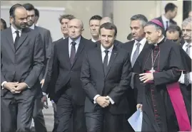  ?? (Photo MaxPPP) ?? Le chef de l’Etat était entouré de l’archevêque de Rouen, Mgr Lebrun, du Premier ministre Edouard Philippe, du ministre de l’Intérieur, Gérard Collomb, et de nombreuses personnali­tés.