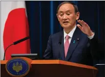  ??  ?? PM Yoshihide Suga reveals Japan is extending some restrictio­ns