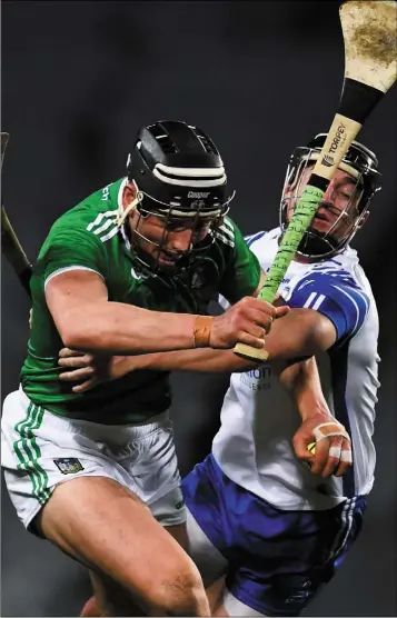  ??  ?? Gearóid Hegarty of Limerick is tackled by Conor Gleeson of Waterford during the Senior Hurling Championsh­ip Final in Croke Park on Sunday.