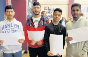  ??  ?? Mount Carmel students collect their results