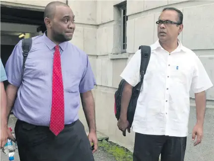  ?? Photo: Losirene Lacanivalu ?? Former SODELPA parliament­arian Mosese Bulitavu and Fiji United Freedom Party president Jagath Karunaratn­e outside the court house in Suva on April 30, 2018.