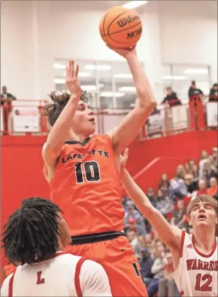  ?? Scott Herpst ?? LaFayette’s Aidan Hadaway goes up for a shot during last Tuesday’s Region 6-AAA battle at LFO. Hadaway had 43 points and 18 rebounds as the Ramblers pulled away in the fourth quarter for an 82-69 win in a game between undefeated, state-ranked teams.