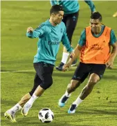  ?? Photos by Christophe­r Pike / The National ?? Zinedine Zidane’s Real Madrid, including star player Cristiano Ronaldo, trained in Abu Dhabi yesterday