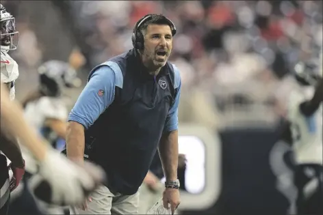  ?? AP PHOTO/ERIC GAY ?? Tennessee Titans head coach Mike Vrabel yells to his players during the first half of an NFL football game against the Houston Texans on Sunday in Houston.