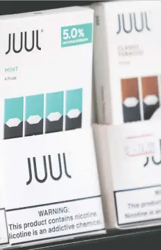  ?? ELIJAH NOuvELAGE/REUTERS ?? Juul Canada will temporaril­y stop making vaping pods with mango, cucumber, fruit and vanilla flavours. The feds are considerin­g more restrictio­ns on flavoured vapes.