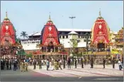  ?? PIC/PTI ?? Devotees maintain social distancing while taking part in Lord Jagannath Rath Yatra at Bada Danda in Puri