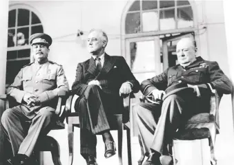  ?? THE ASSOCIATED PRESS ?? Stalin, left, Roosevelt and Churchill first met in the Iranian capital of Tehran in 1943.