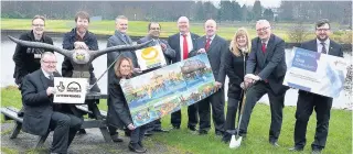  ??  ?? Park life Councillor Michael McPake, seated far left, and other elected members join staff from NLC and CultureNL to mark work starting on the crannog play area