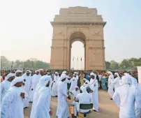  ?? Supplied photo ?? Emiratis perform traditiona­l dance in front of the India Gate in New Delhi as part of the New Delhi World Book Fair. —
