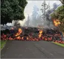  ?? GEOLOGICAL SURVEY VIA GETTY IMAGES U.S. ?? A lava flow moves on Makamae Street after the eruption of Hawaii’s Kilauea volcano on Sunday in the Leilani Estates subdivisio­n near Pahoa, Hawaii.
