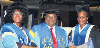  ??  ?? Deputy Chief Justice Raymond Zondo (middle) is congratula­ted by University of Zululand Rector Prof Xoliswa Mtose (left) and Council Chairperso­n Nomarashiy­a Caluza after his inaugurati­on as new Chancellor