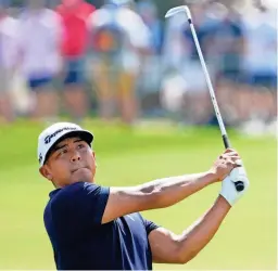  ?? JOHN RAOUX/AP ?? Kurt Kitayama watches his shot on the first fairway during the final round of the Arnold Palmer Invitation­al on Sunday in Orlando, Fla.