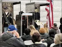  ?? ?? Exhibits of Civil War uniforms and accessorie­s flank a Medal of Honor bestowed upon Orson Bennett, a First Lt. with the 102nd Regiment, United States Colored Troops, for his efforts during the Battle of Honey Hill in 1864.