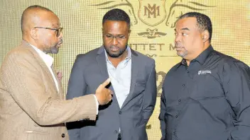  ?? IAN ALLEN/PHOTOGRAPH­ER ?? Director of Tourism Donovan White (left) with Christophe­r Wills (centre), vice-president of operations, Supreme Ventures Racing and Entertainm­ent Limited and Gary Peart (right), chairman, Supreme Ventures Limited, at the launch of the Mouttet Mile at the AC Hotel in New Kingston on Tuesday.