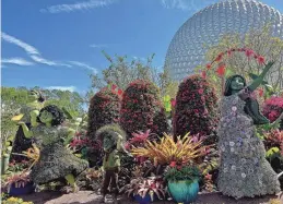  ?? EVE CHEN/USA TODAY ?? EPCOT Internatio­nal Flower & Garden Festival’s colorful “Encanto” display greets park guests.