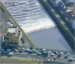  ??  ?? MIYAGI PREFECTURE: Water flows up in the Sunaoshi River in Tagajo, Miyagi prefecture, northern Japan, as a tsunami warning is issued following a strong earthquake yesterday.— AP