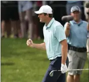  ?? CHARLIE NEIBERGALL – THE ASSOCIATED PRESS ?? Scottie Scheffler celebrates his birdie putt on the eighth hole on his way to winning The Players Championsh­ip.