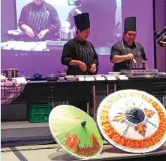  ??  ?? CULINARY delights demonstrat­ed on stage by Thai chefs
