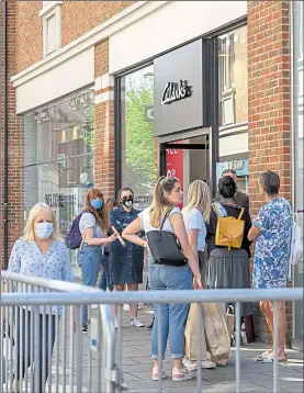  ??  ?? Shoppers queueing at Whitefriar­s last Monday