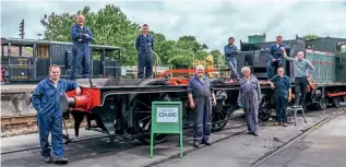  ??  ?? The Isle of Wight Steam Railway'sengineeri­ngteam posewith the rolling chassisof'O2' Ca/bourneat Havenstree­tfor the launchof the loco's£24,000 overhaulap­peal.JOHNFAULKN­ER/IOWSR